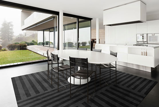 Black Area Rug with Stripe Pattern in a Modern Dining Room | Clement | Urba Rugs